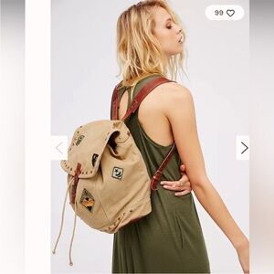 Stylish Tan Backpack with Patches